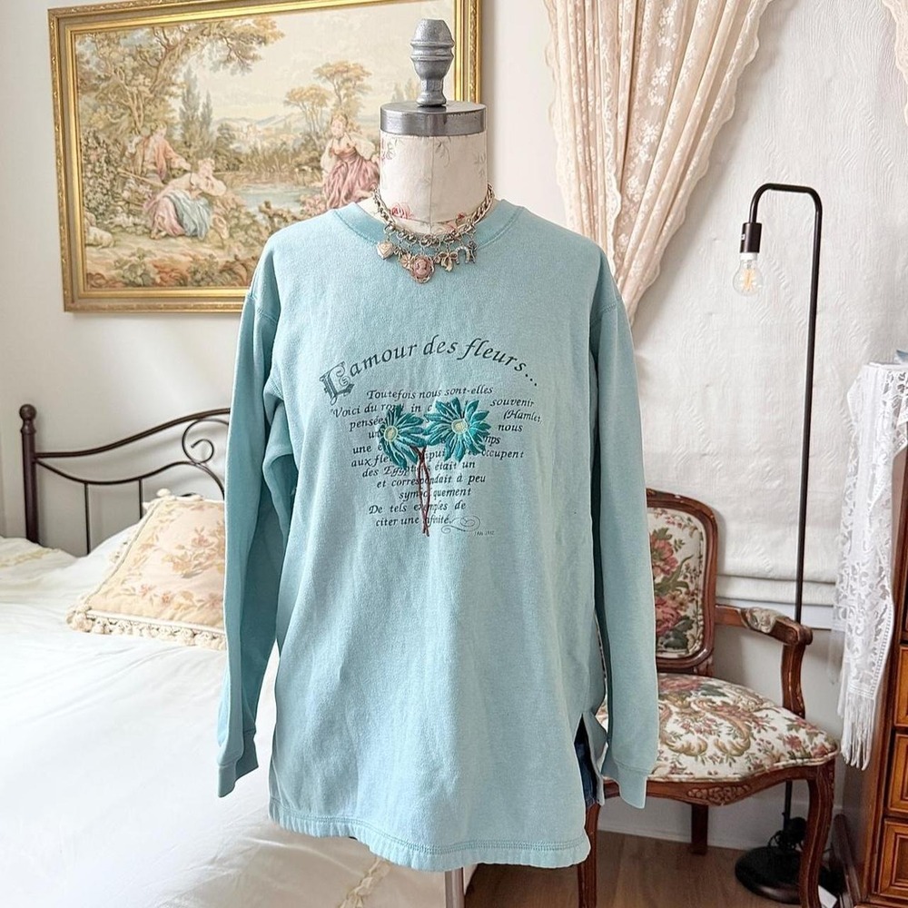 Y2K French Laundry fits like a size large pastel blue floral graphic sweatshirt